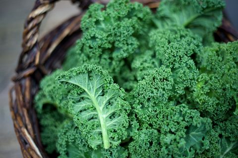 kale-in-rustic-basket-on-daylight-close-up-royalty-free-image-628364204-1533848320
