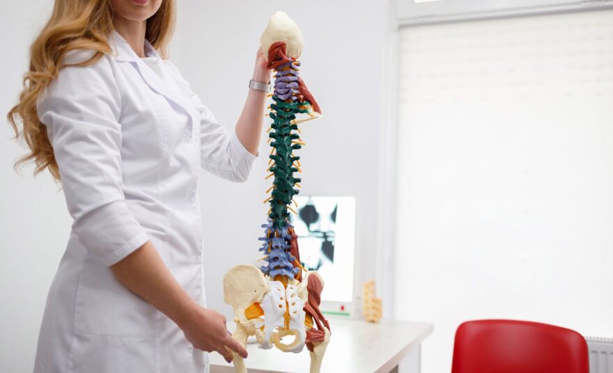 https://wellnessdoctorrx.com/wp-content/uploads/2023/10/female-doctor-with-anatomical-spine-model-in-clini-2022-09-22-15-36-53-utc_02-880x536.jpg
